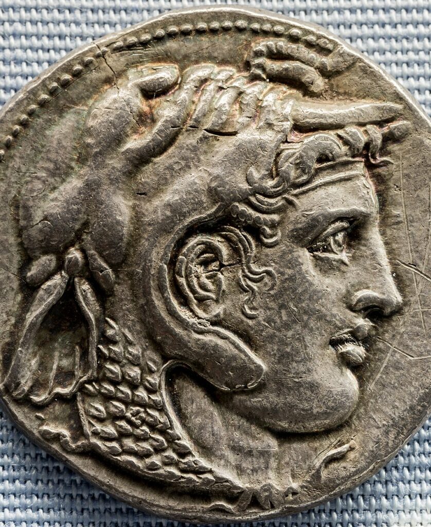 Silver coin, Alexander facing right, elephant's head covering his head