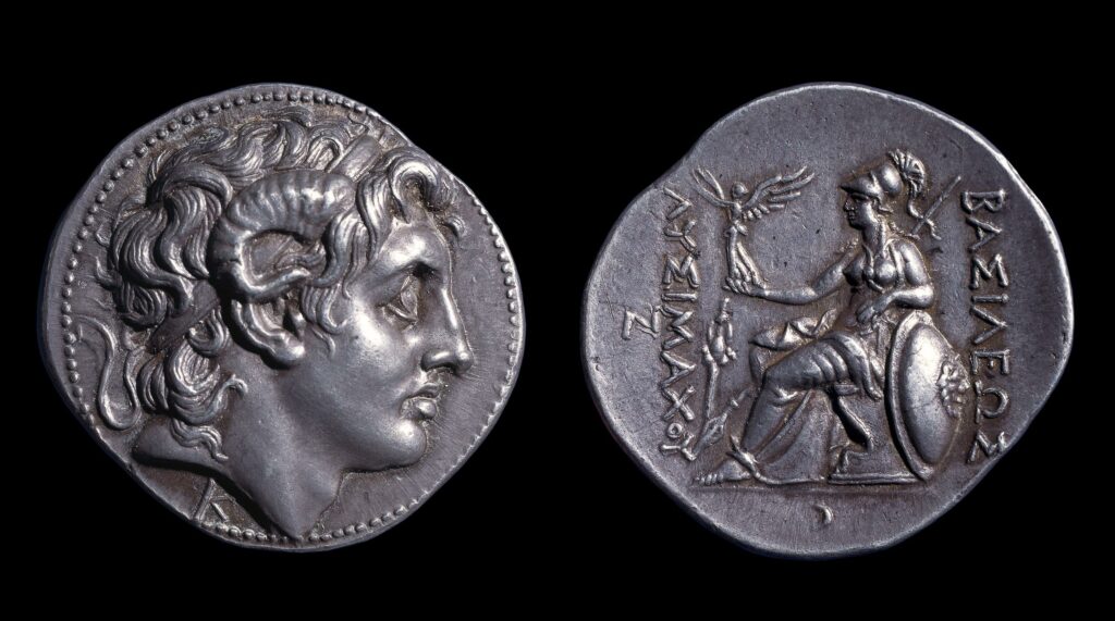 Silver coin, head of Alexander the Great facing right with ram’s horn (obverse), and Nike (Victory) with shield and wreath