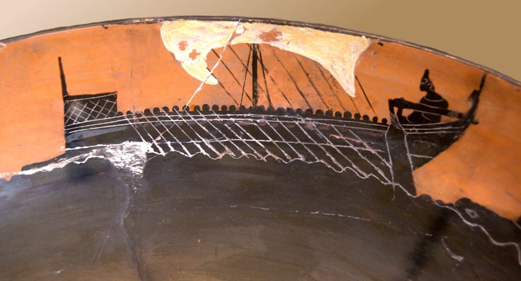 boat on interior of cup