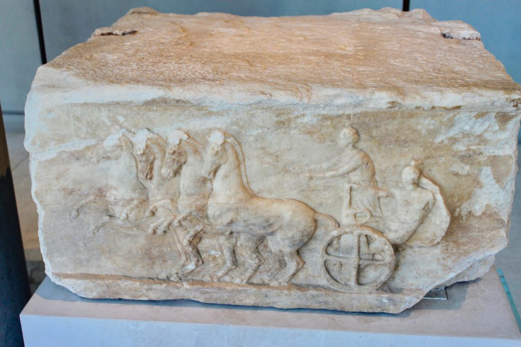 Apobates Race, Base of a dedication. The Relief represents a scene from the Apobates Race.