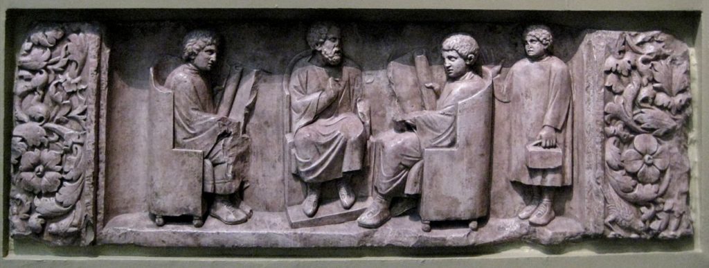 Roman relief of teacher and pupils