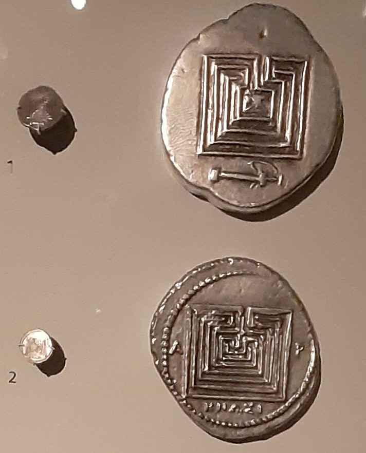 Coins with labyrinth design