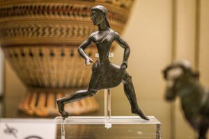 Bronze sculpture of girl running